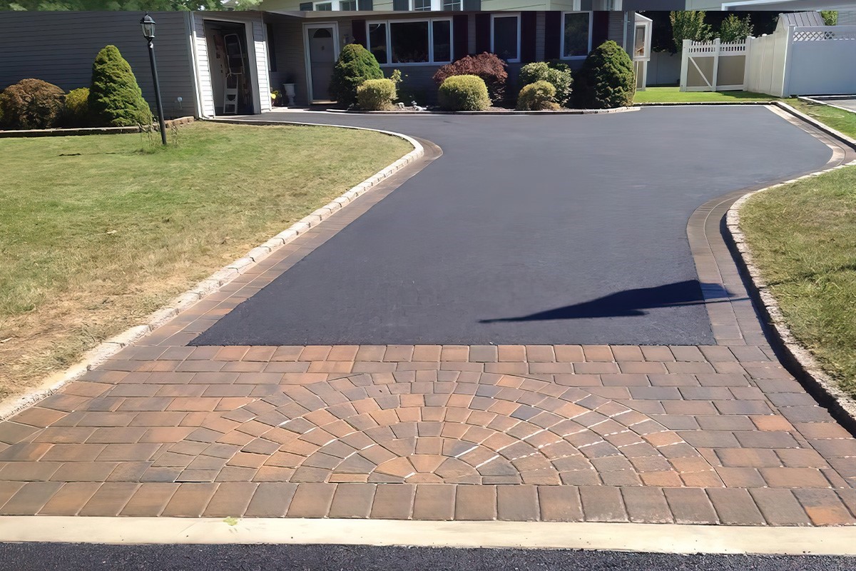 Driveway paving with paver apron and clean edging