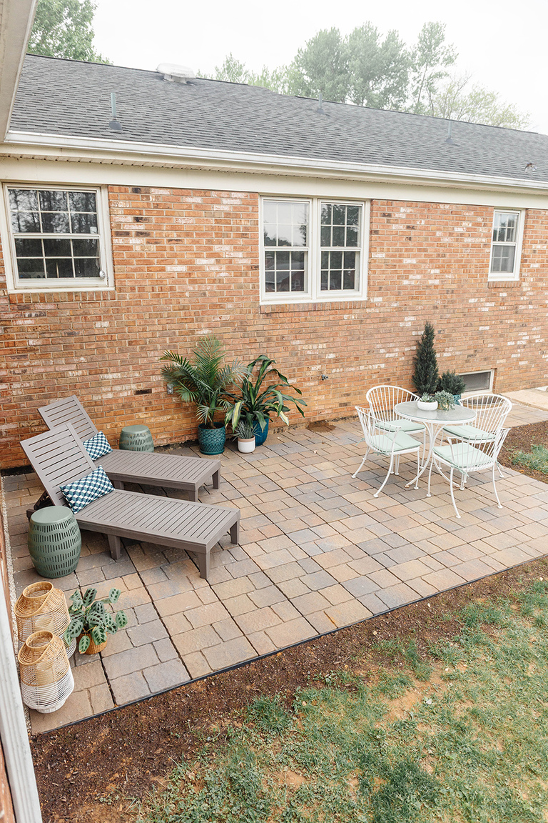 Simple backyard paver patio with seating